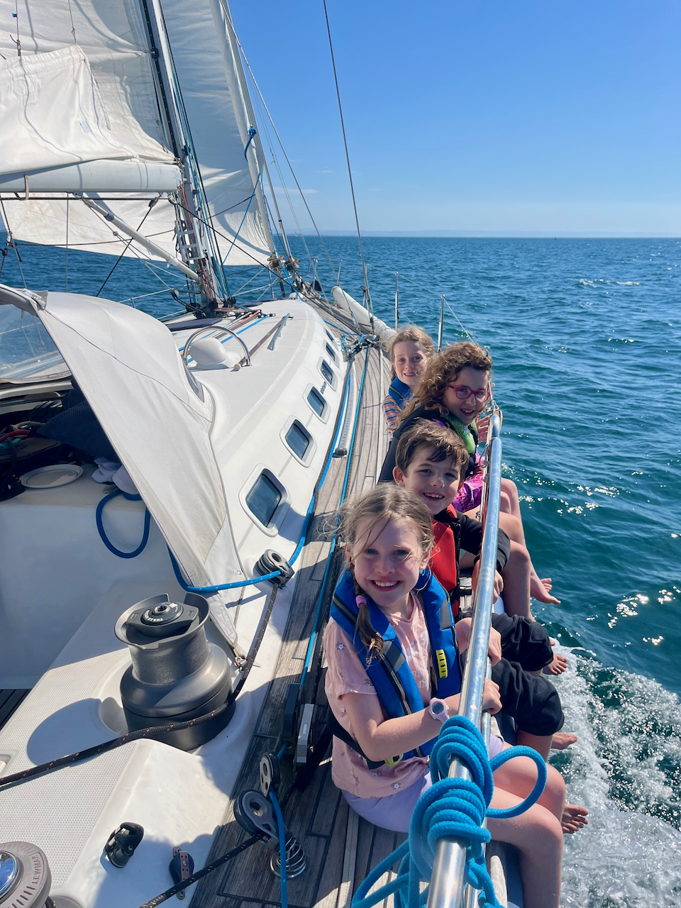 Kids having fun sailing home