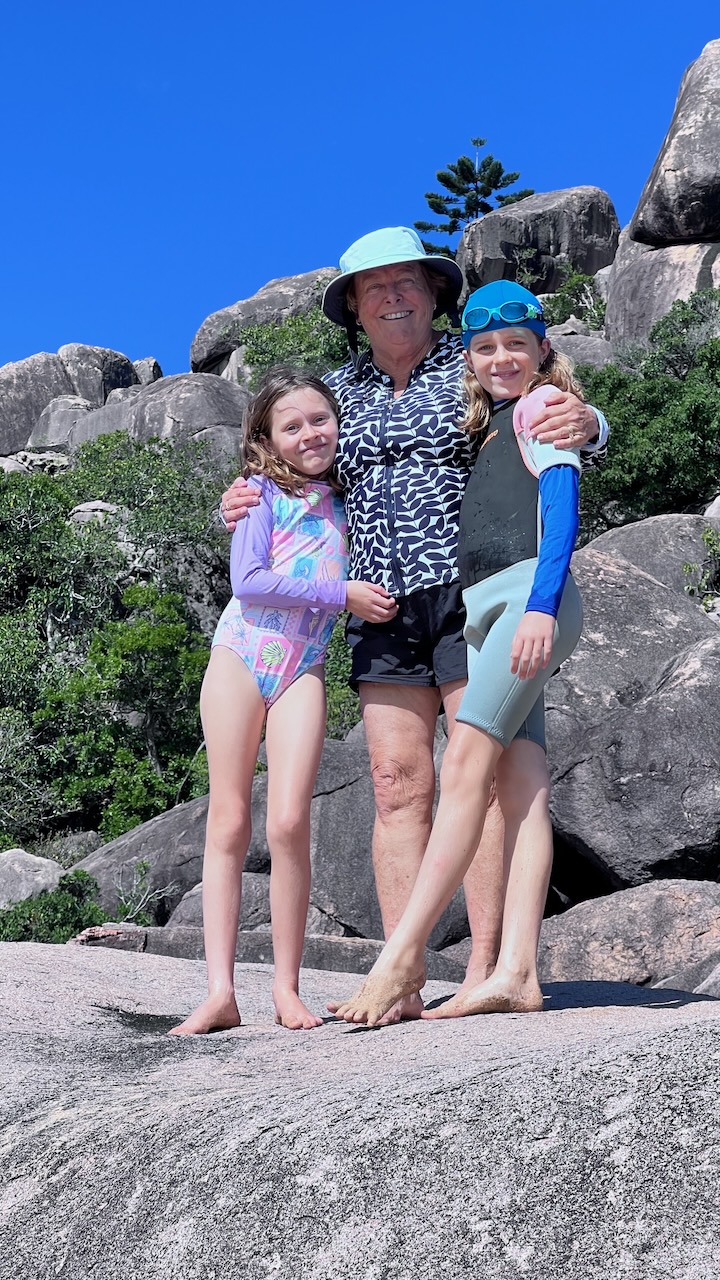 The girls and Grandma on their jumping rock