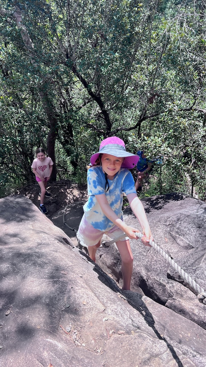 There's a rope in place to haul yourself up the rocks at the top