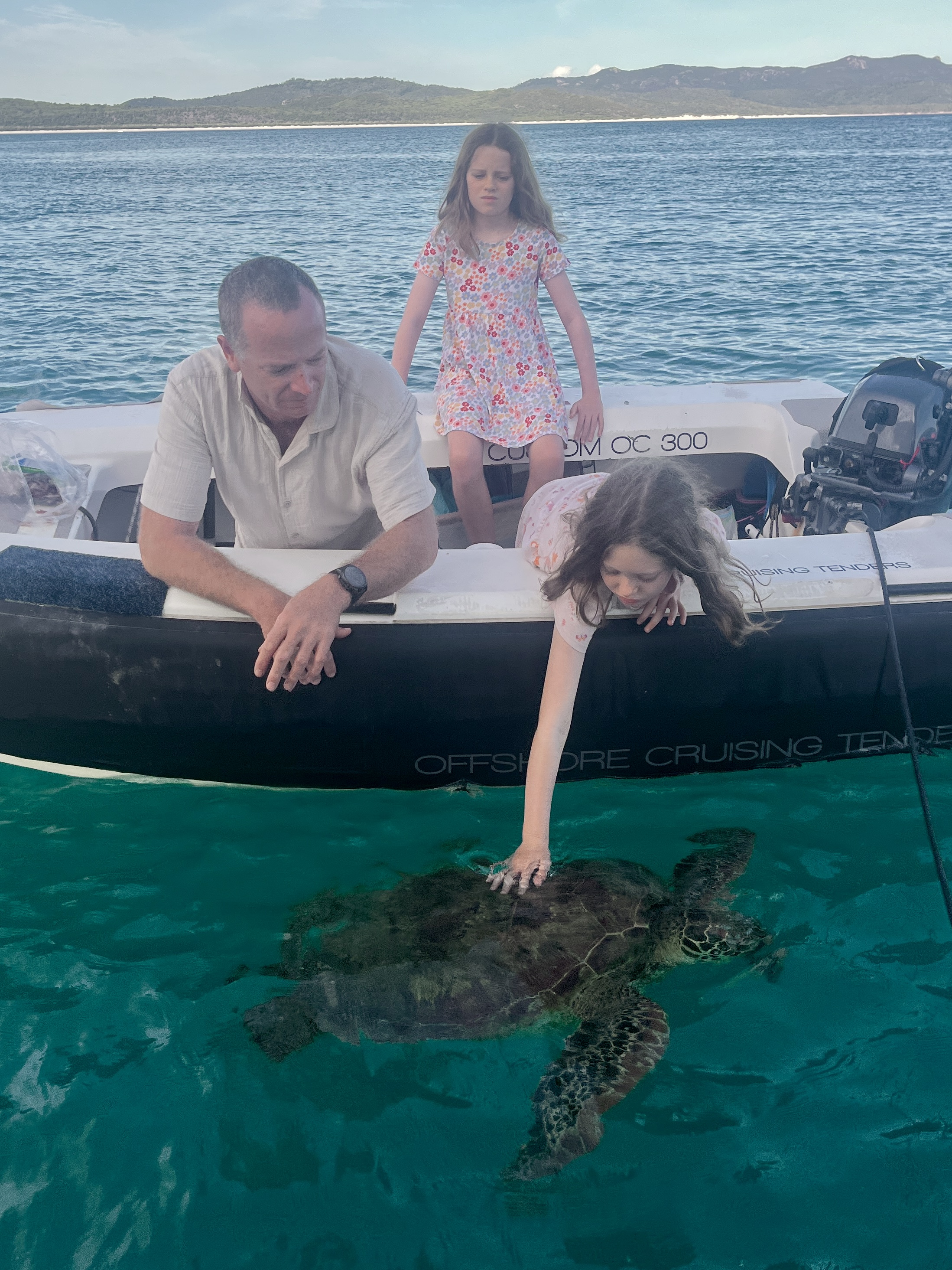 It was easier for us to jump in the tender rather than crowd on the back swim step