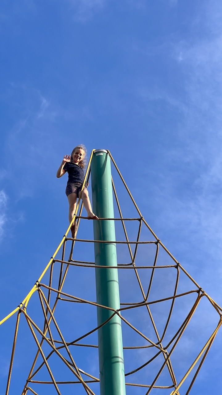 A quick climb at the plaground near the lagoon
