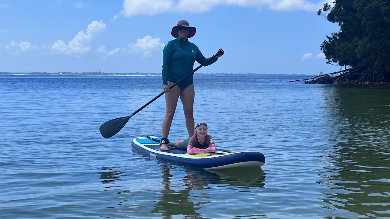 Kristie enjoyed SUP'ing with the Dolphins!
