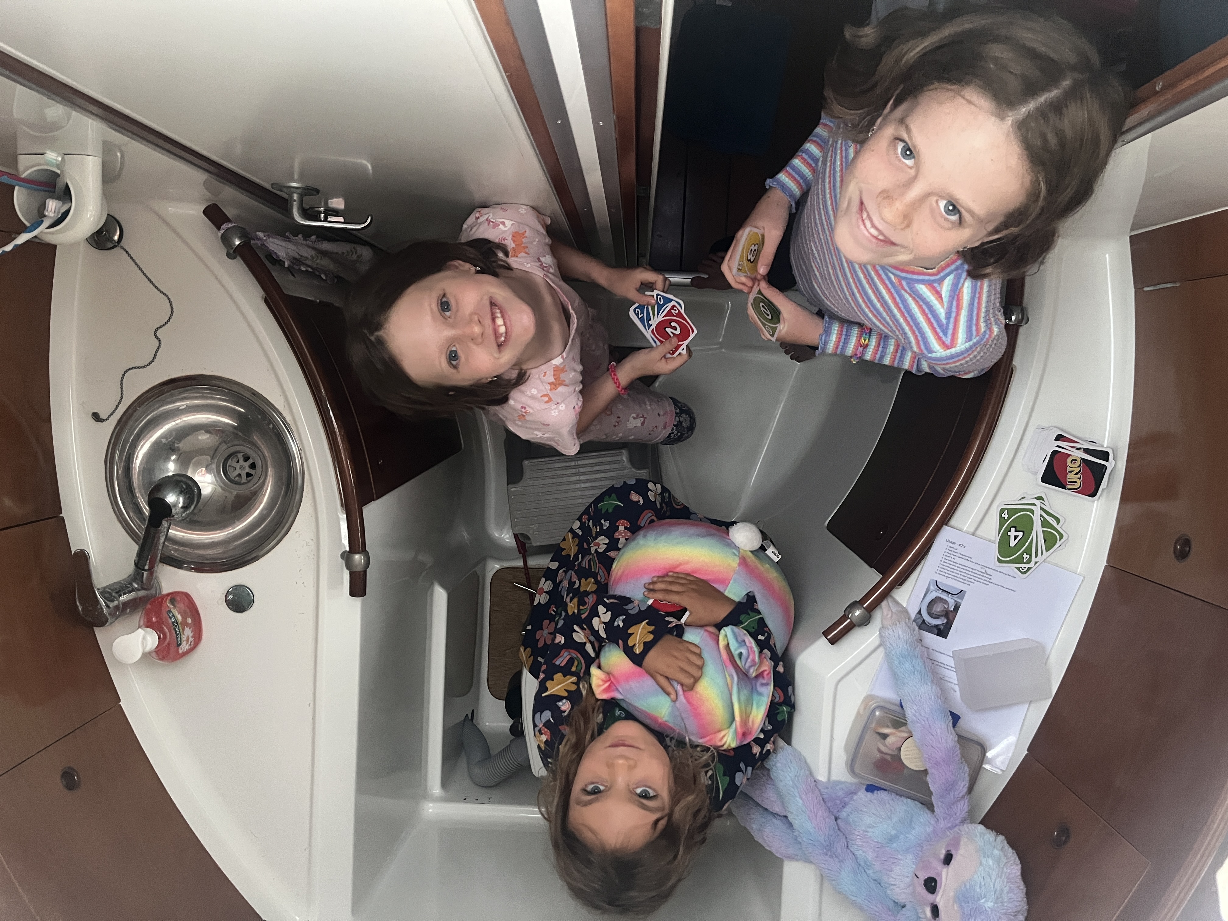 Hiding in the toilet playing Uno