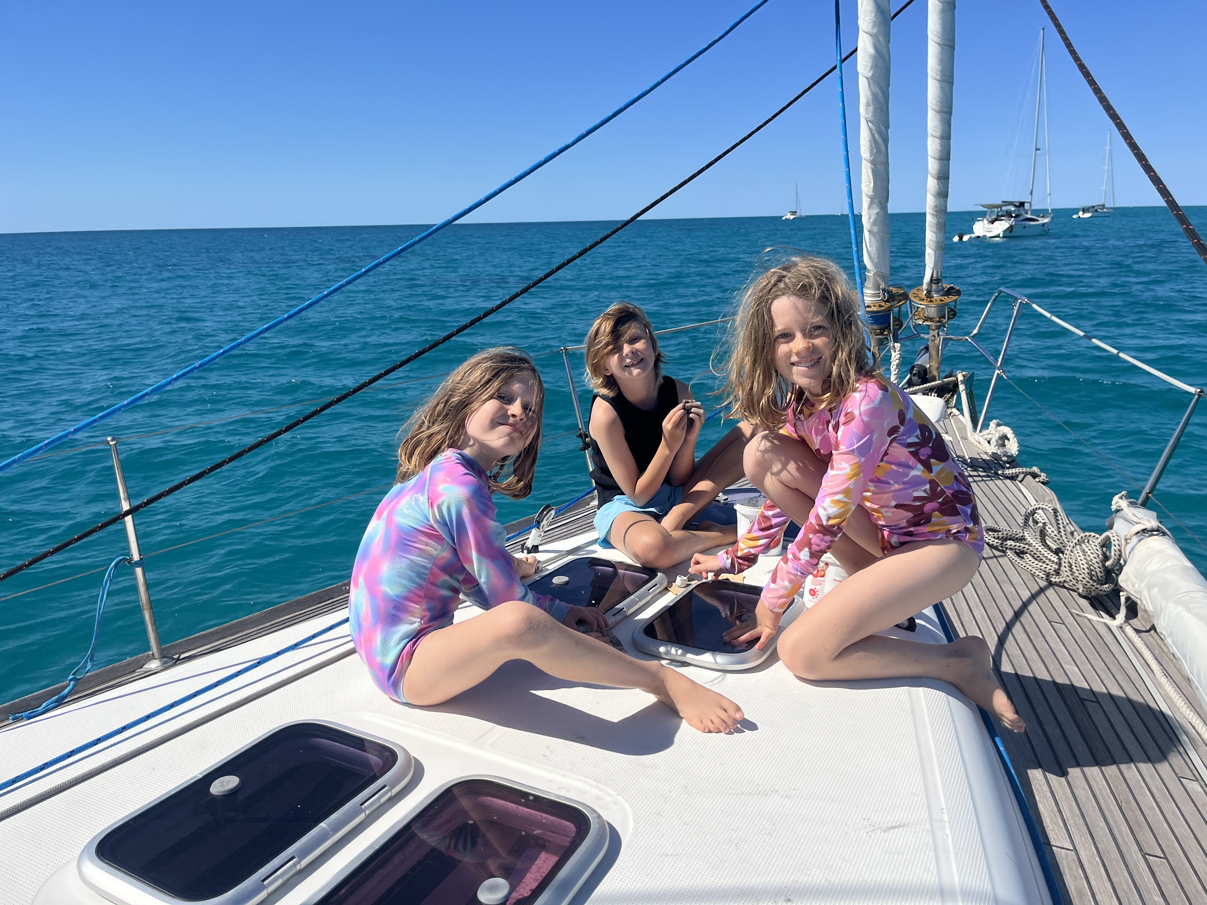 The girls making creations with the mud from Nara Inlet