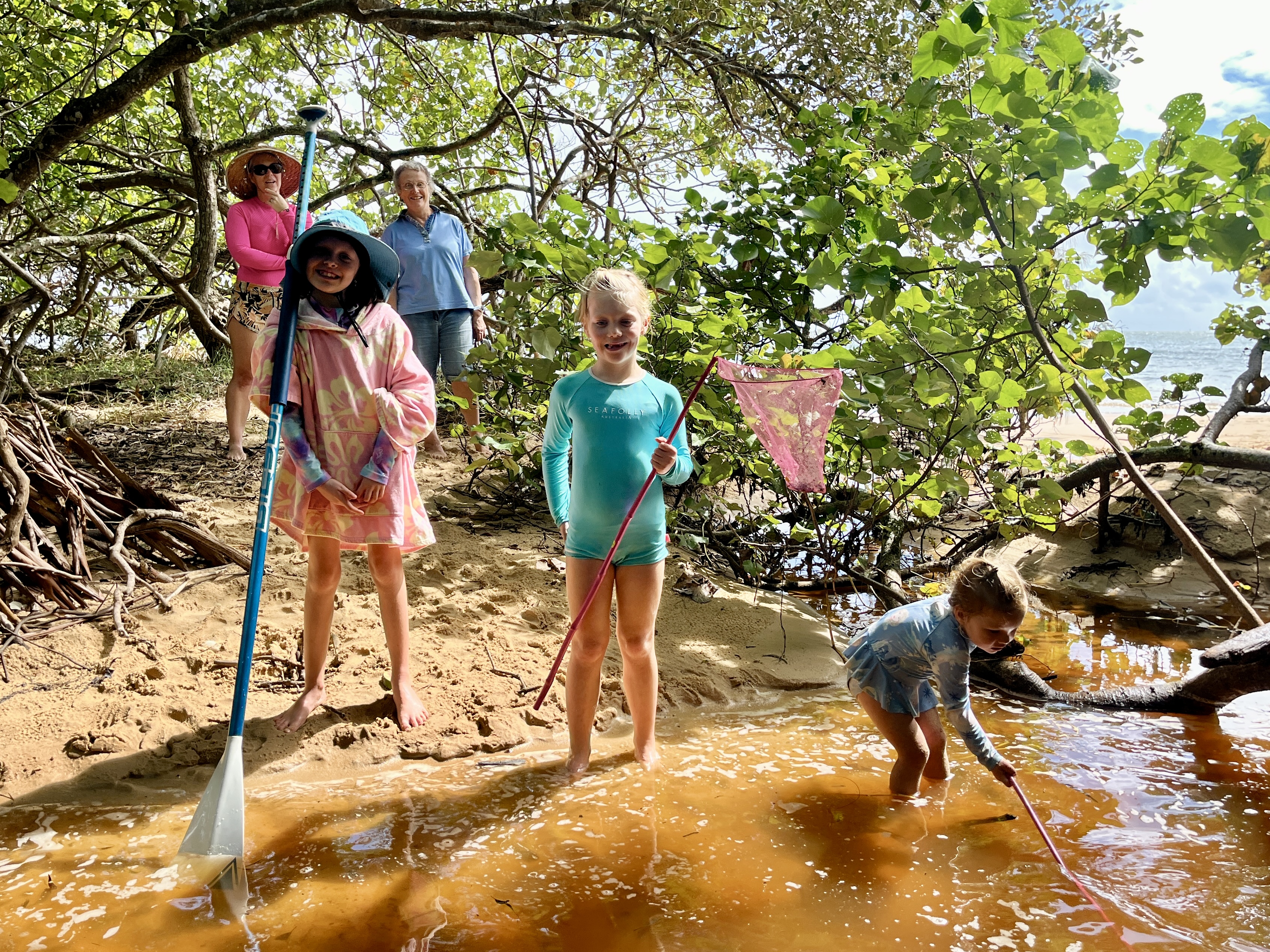 Playing in the creek at Coochie