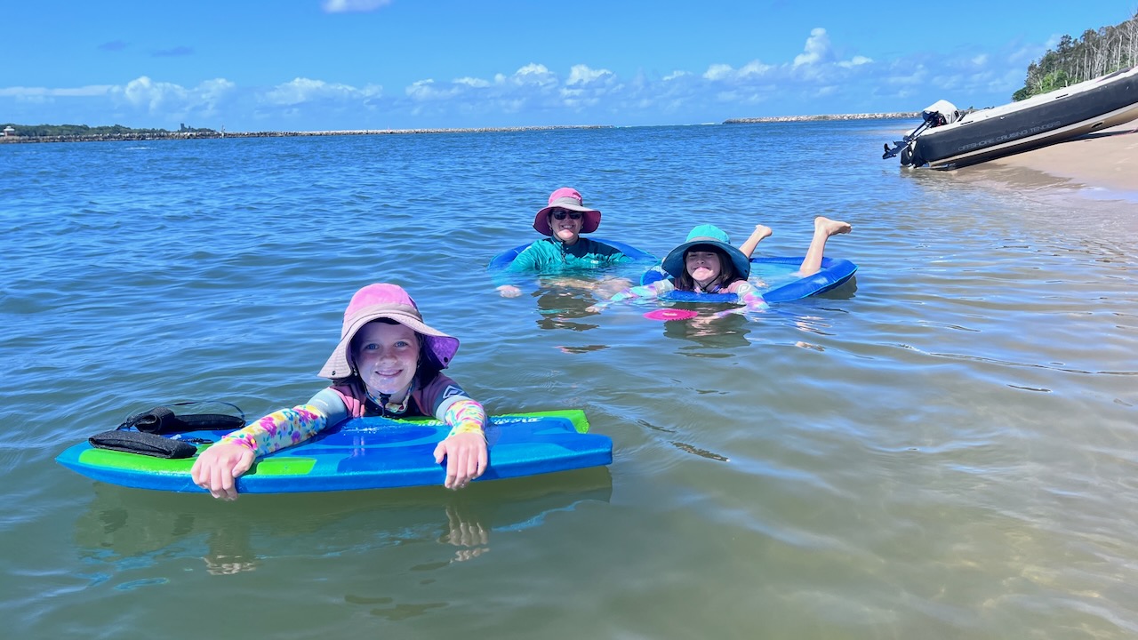 Relaxing at Whiting beach.. our last ocean/river swim in Yamba