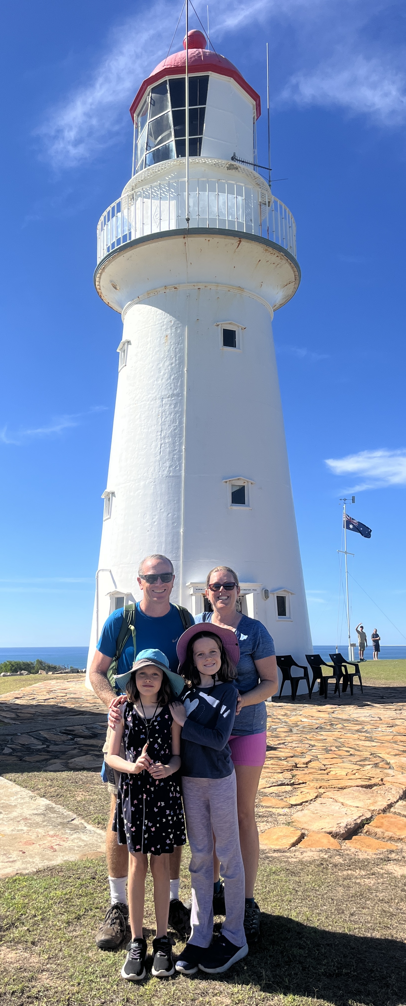 We got the caretaker to snap of photo of us in front of the lighthouse
