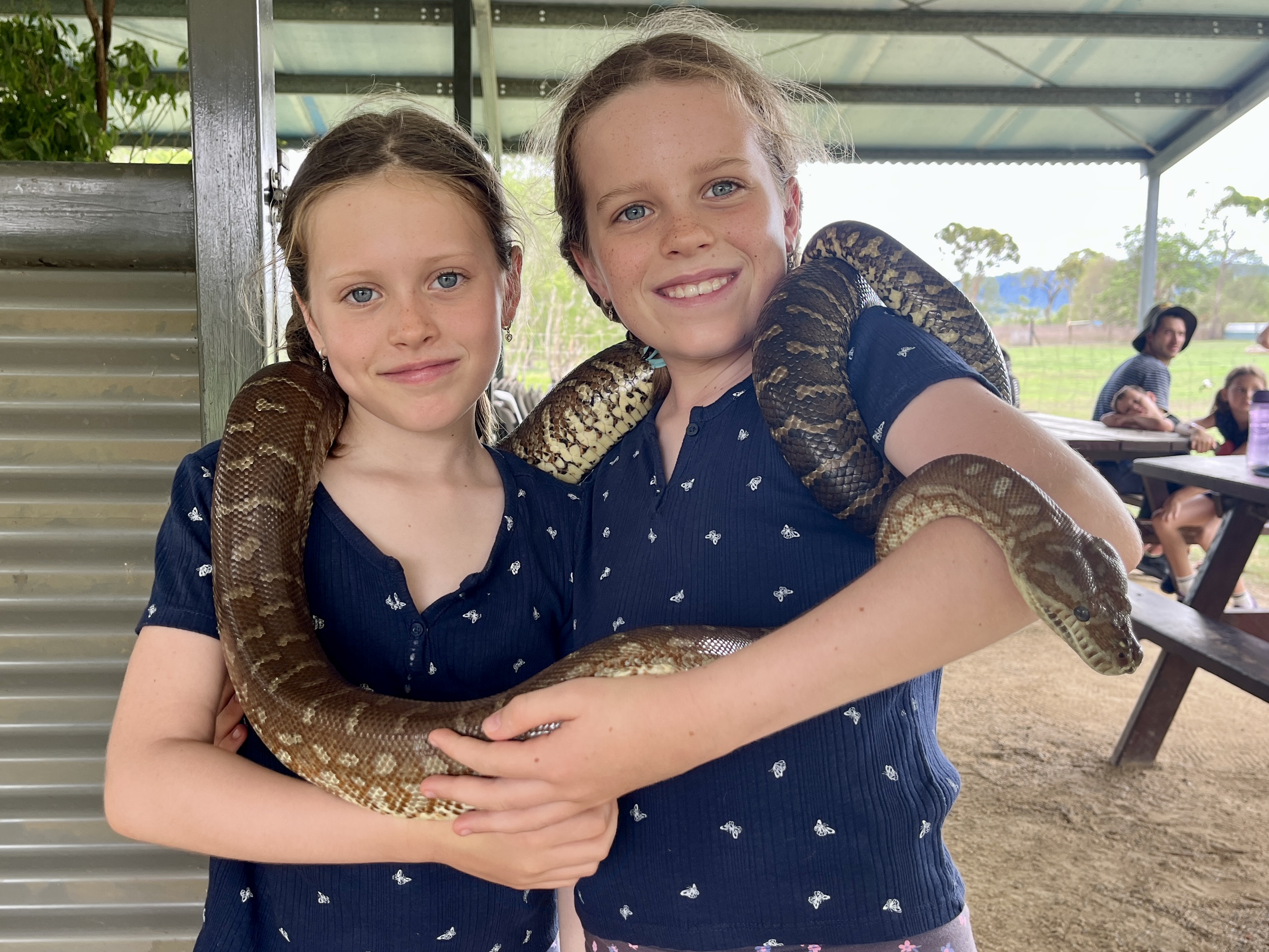The girls shared the snake