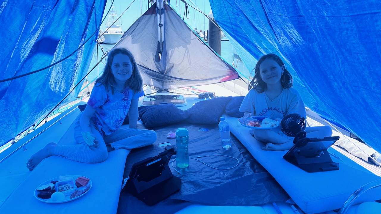 Having fun up top. Was much cooler under the tarp in the breeze than it was downstairs