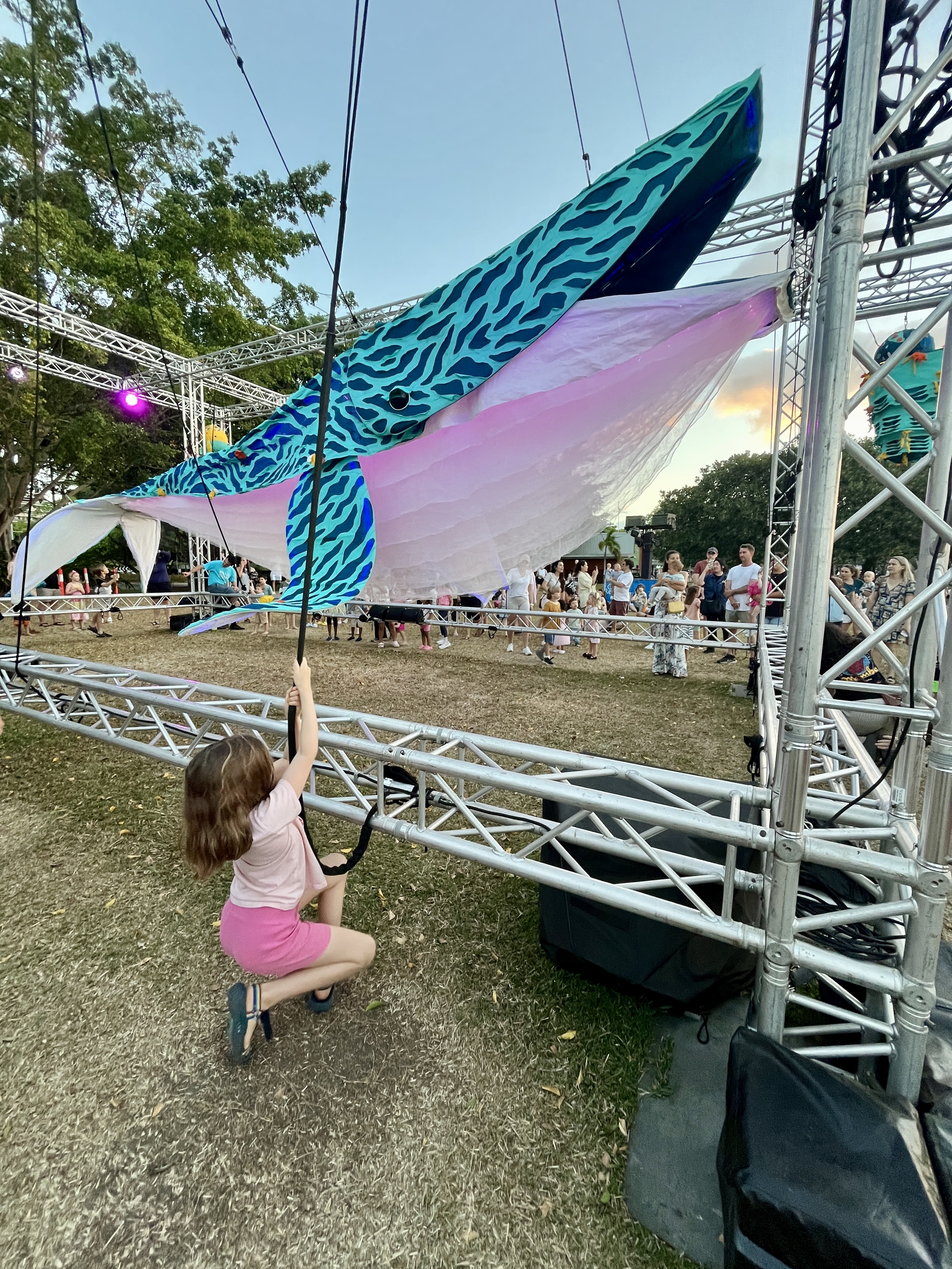 Emma pulling down on the ropes to open the mouth