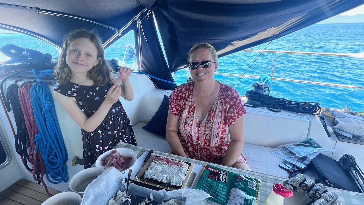 Emma loves fish, loves helping make food, and loves sushi