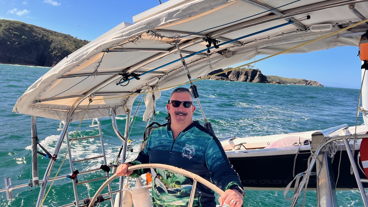 Rounding more headlands.. we enjoyed watching the paraglider (top left)